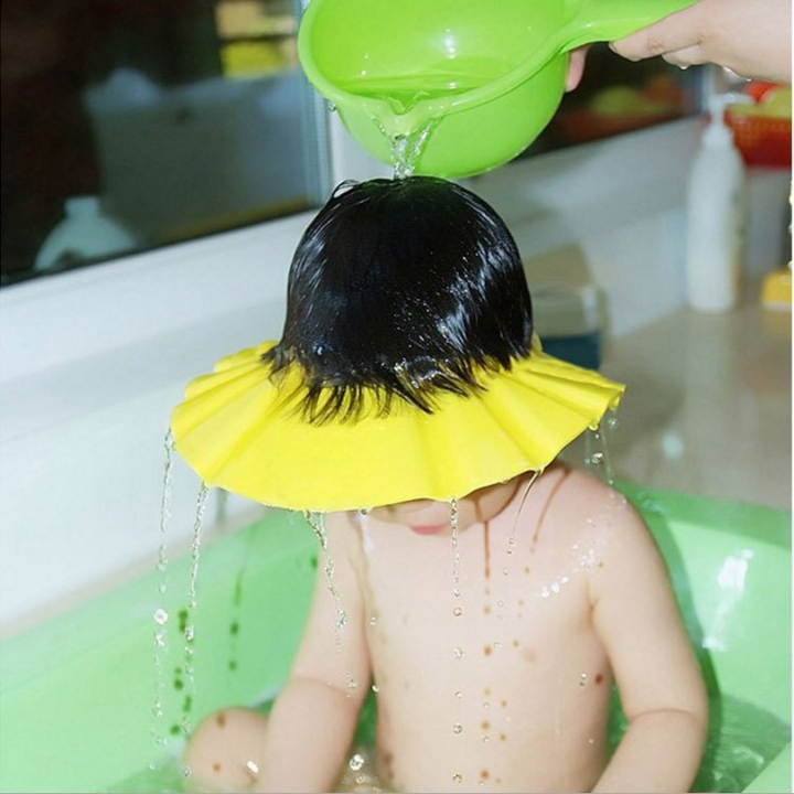 ShampooCap™| Visière chapeau pour douche bébé.